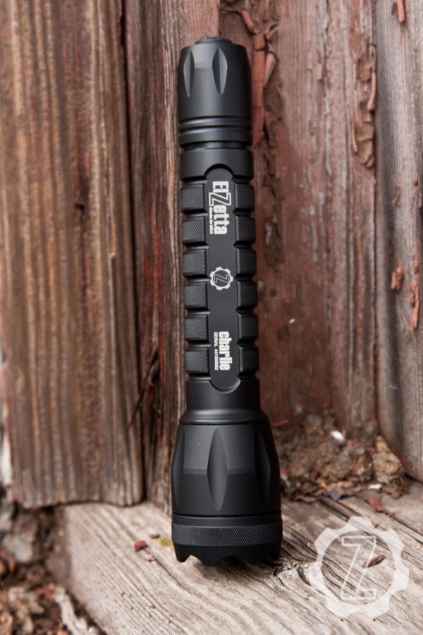 Main image for Charlie Configurator page showing Charlie Flashlight on wood