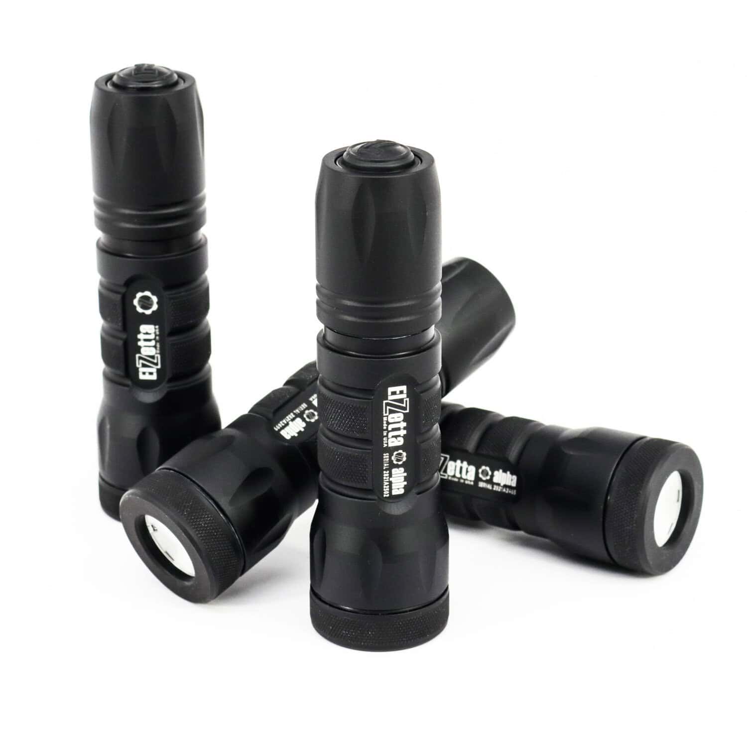 Group of Alpha flashlights on white background. Gallery pic for Alpha garage sale listing.