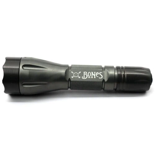 gallery image 1 of bones flashlight with blemishes. scuffed surface and mismatched color variations.