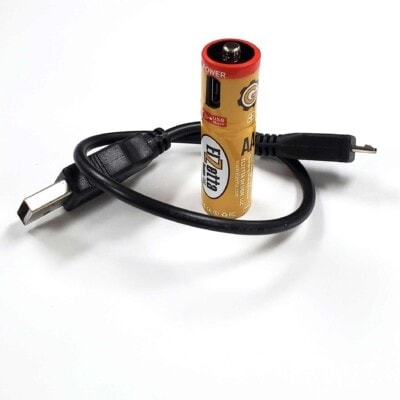 Elzetta Brand rechargeable AA battery cell with USB port and charging cable.