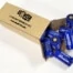 Image of cardboard box full of 12- CR123 battery cells. Box is open and several batteries can be seen at the opening. Text on Box: "Elzetta Design, CR123 Batteries (12 ct.), www.elzetta.com"