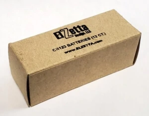 Image of cardboard box full of 12- CR123 battery cells. Text on Box: "Elzetta Design, CR123 Batteries (12 ct.), www.elzetta.com"
