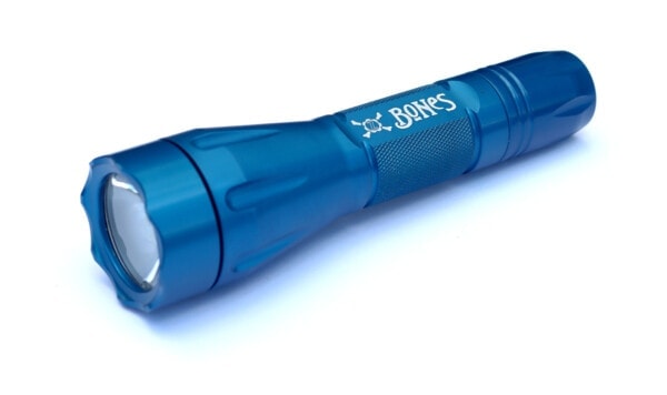Elzetta Blue Bones flashlight on white background